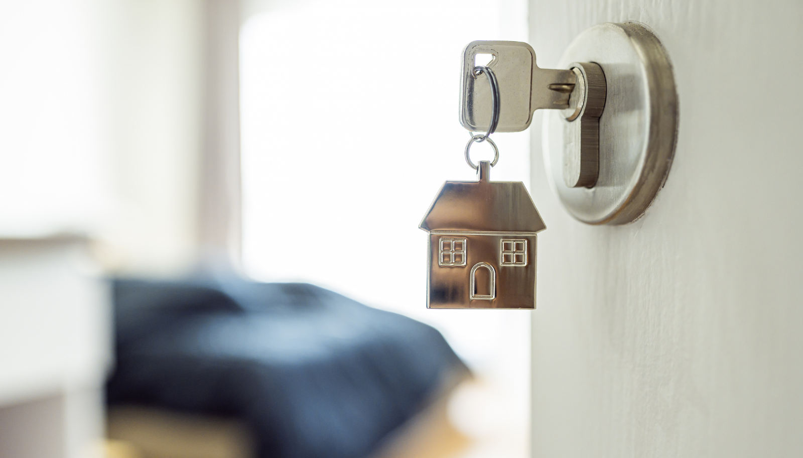 House rule cards and a lockbox beside the front door of a rental